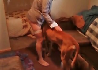 Mature woman is playing with a beast